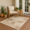 Weather-resistant rug styled on a patio or entryway