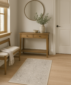 Traditional small rug styled in a classic entryway