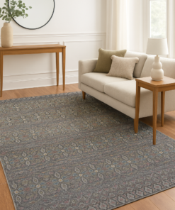 Modern area rug styled in a neutral-toned interior