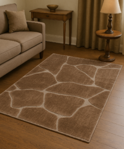 Modern neutral rug styled in a contemporary space